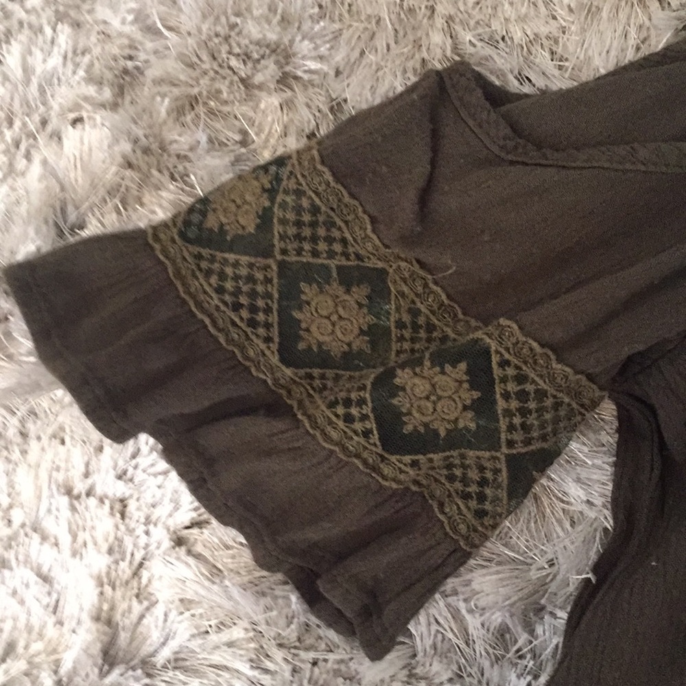 Army green shirt from a boutique in Calabasas